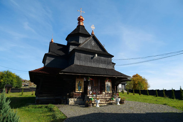 Church of Nativity of Blessed Virgin Mary of 17-18 centuries in Vorokhta, western Ukraine, Carpathians. Church belongs to Hutsul school of traditional temple building, was build without nails - Fotó, kép