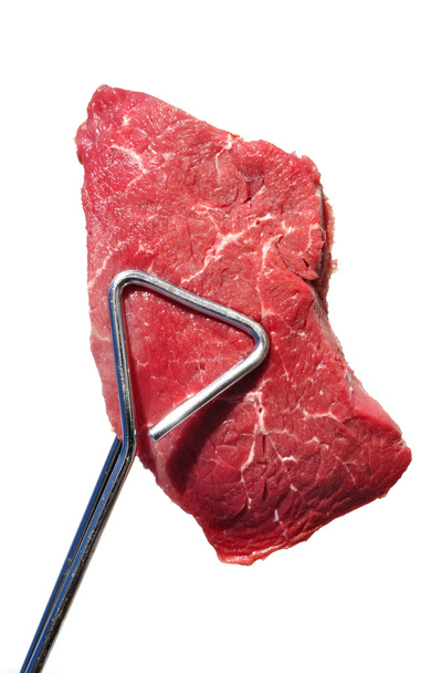 Tongs Holding Raw Beef Loin Top Sirloin Steak - Foto, Imagen