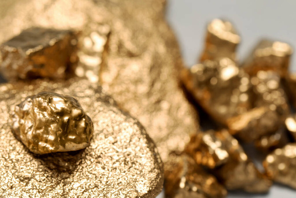 Closeup view of shiny gold nuggets, closeup. Space for text - Фото, зображення
