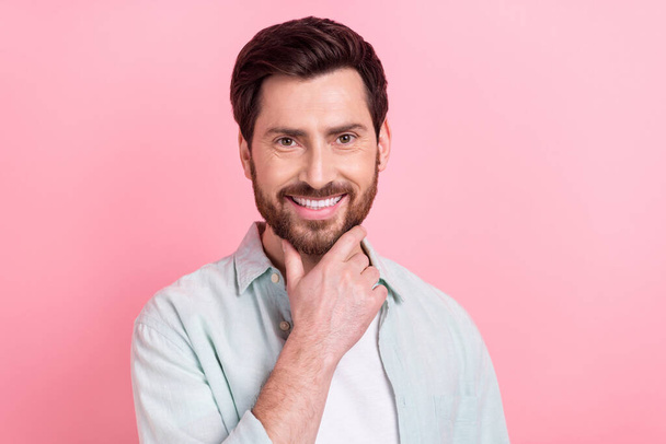 Photo portrait of handsome young guy touch chin think business strategy wear trendy blue clothes isolated on pink color background. - Foto, Imagem