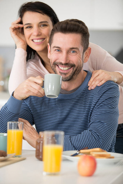 couple enjoying a breakfast together at home - Zdjęcie, obraz