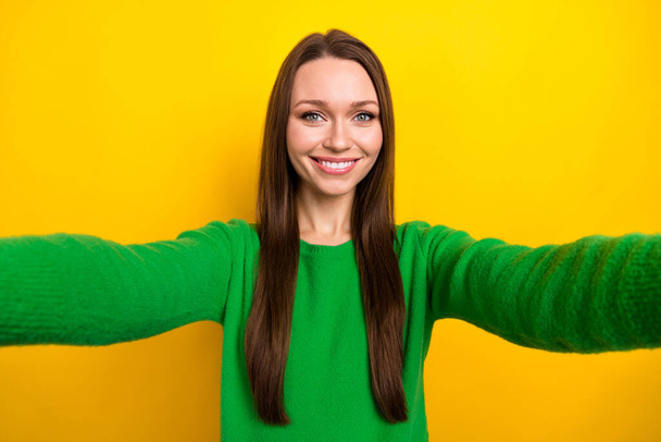Photo of satisfied glad lady beaming smile make selfie recording video isolated on yellow color background. - Фото, изображение