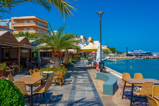 Sitia, Greece, August 18, 2022: Restaurants at seaside promenade at Greek town Sitia. - Fotoğraf, Görsel