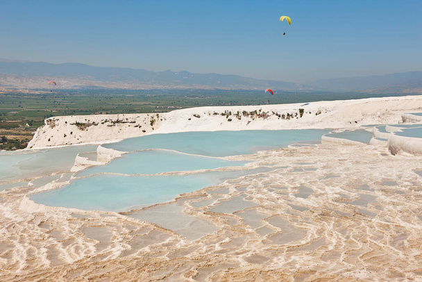 Pamukkale white mineral limestone natural pool. Geology landmark in Turkey - Fotoğraf, Görsel