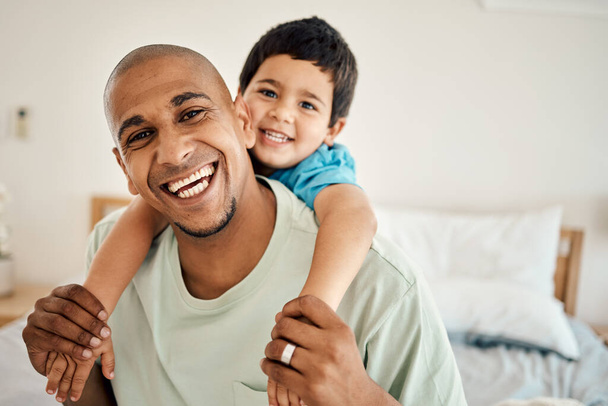 Happy family portrait, bonding and child hug father, papa or dad for morning affection in hotel bedroom. Vacation happiness, piggyback or face of smiling man and youth kid enjoy quality time together. - Fotoğraf, Görsel
