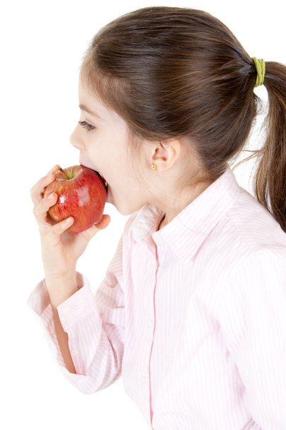 Little girl eating apple - Photo, Image