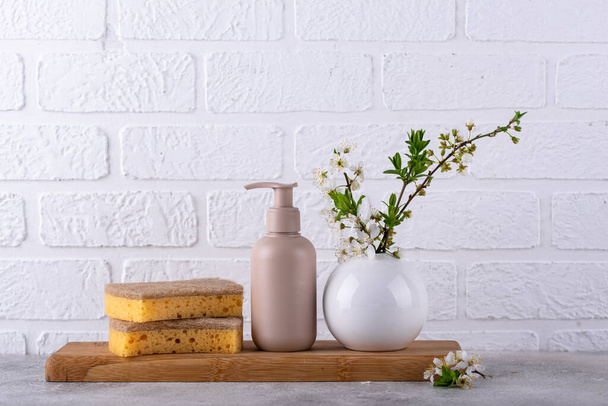 Eco cleaning with bottles, brushes and sponges, zero waste sustainable concept - Photo, image