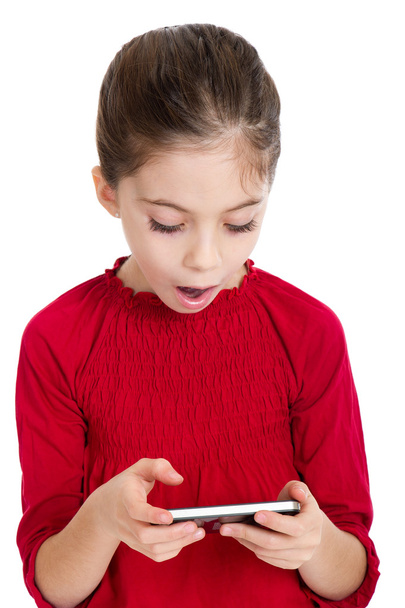 Little girl with smartphone - Фото, изображение