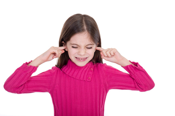 Girl putting finger on her ears - Φωτογραφία, εικόνα