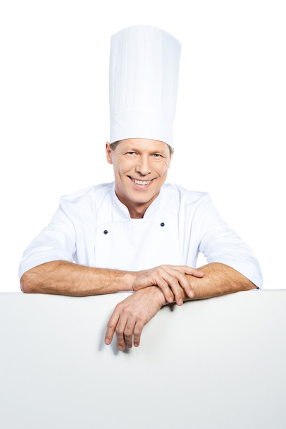 Chef leaning at copy space - Фото, зображення