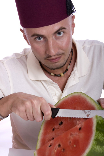 Man with watermelon - Фото, изображение