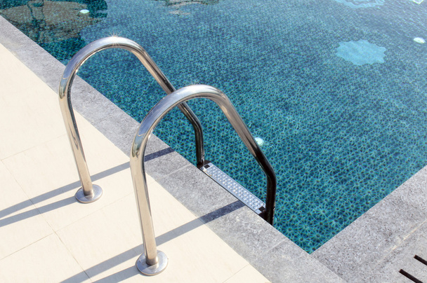 Metal staircase to the entrance to the swimming pool - Photo, Image