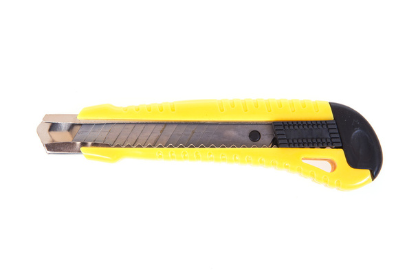 Žlutý psací nůž izolovaný na bílém pozadí - Fotografie, Obrázek