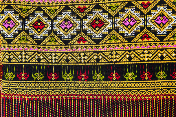 Színes thaiföldi stílusú szőnyeg felülete közelről. Több ez a motívum - Fotó, kép