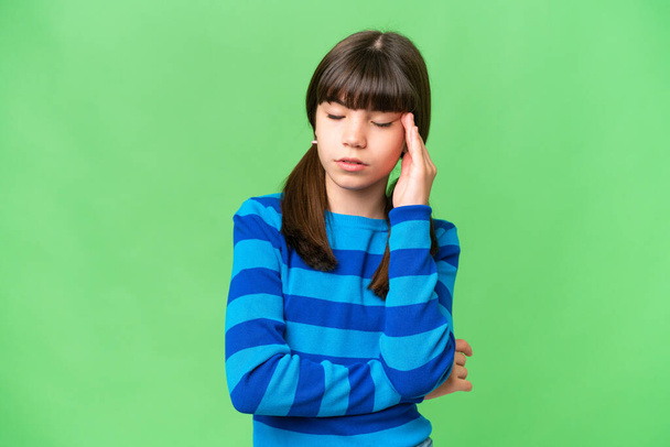 Little caucasian girl over isolated background with headache - Φωτογραφία, εικόνα