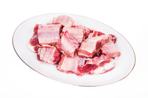 πλευρά χοιρινού κρέατος σε άσπρο φόντο - Φωτογραφία, εικόνα