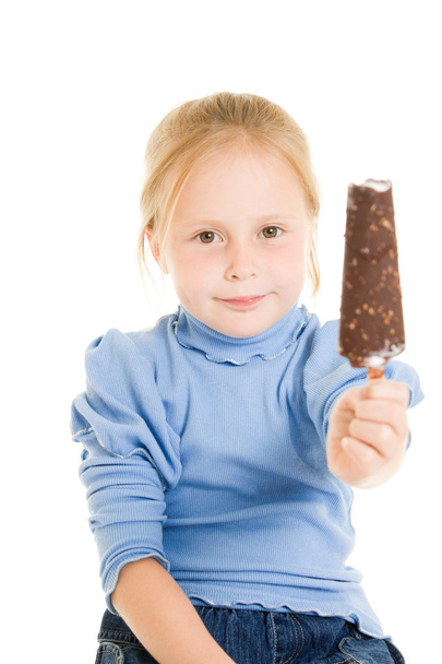 Girl eating ice cream on a white background. - Fotografie, Obrázek