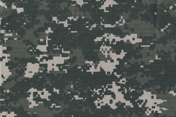 textuur textuur van camouflage rip stop stof. gestructureerde achtergrond closeup - Foto, afbeelding