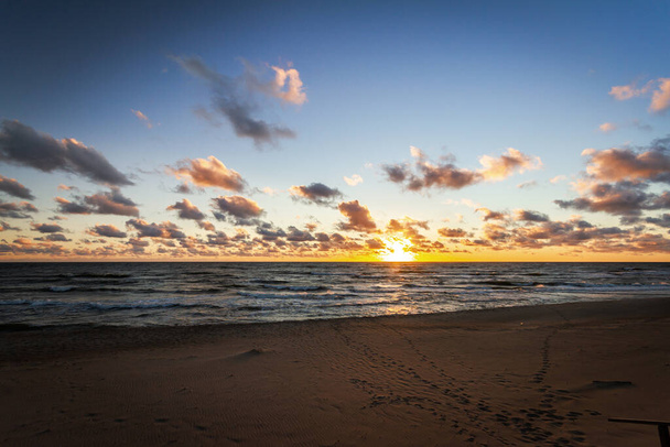 Beautiful sunset with clouds and sea in Lithuania - Fotografie, Obrázek