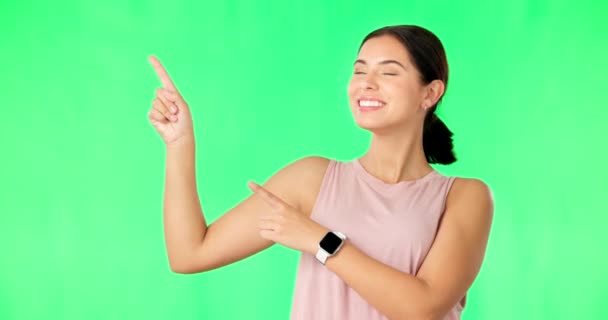 Fitness woman face, hands and green screen pointing with happiness and smile showing gym advertisement. Portrait, isolated and studio background with happy female athlete showing mockup announcement. - Кадри, відео