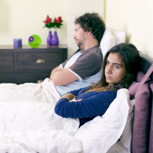 Unhappy couple in bed after fight not talking retro style - Fotoğraf, Görsel
