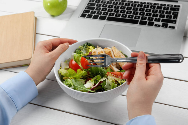 Office employee having business lunch at workplace, closeup - Photo, image