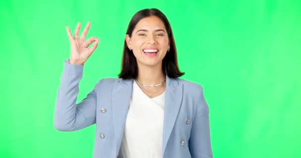 Okay hands, face and woman smile on green screen, background and review of business support. Portrait of female employee, happy and ok for success, yes and bonus for perfect emoji, thank you and sign. - Footage, Video