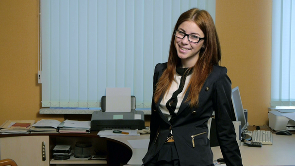 Young woman secretary at work - Footage, Video