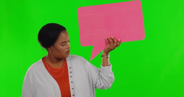 Black woman, questions or speech bubble on green screen for social media promotion or advertising mockup. Promo, marketing or awkward female portrait, shrug or dont know with studio background poster. - Záběry, video