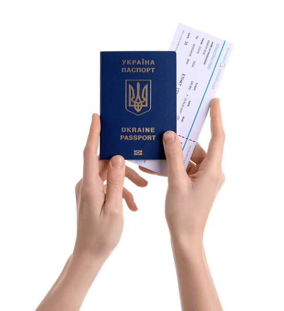 Woman with Ukrainian passport and ticket on white background - Photo, Image