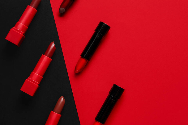 Composition with beautiful lipsticks on color background - Photo, Image