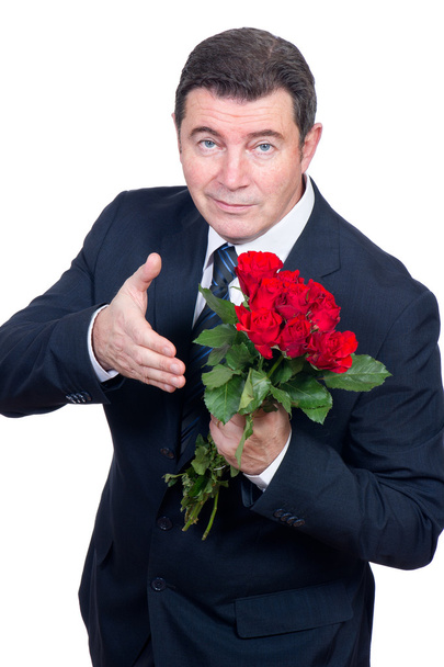 Man with roses - Φωτογραφία, εικόνα
