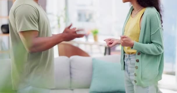 Fight, hands and couple in a living room for argument, crisis or divorce discussion in their home. Hand, anger gesture and angry woman and man in lounge for marriage, affair or problem confrontation. - Filmagem, Vídeo