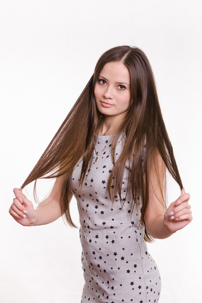 Girl holding her hair - Zdjęcie, obraz
