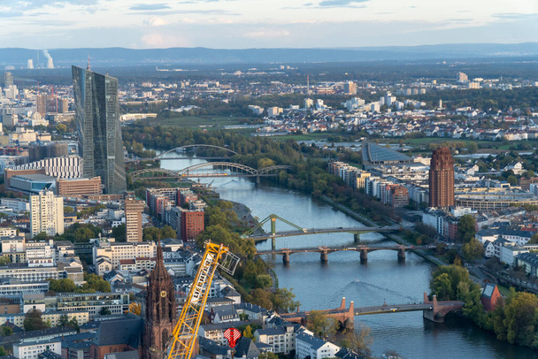 Aerial view of the Frankfurt skyline during sunset. Modern building reflecting the last sunligh of the day. - Foto, Imagem