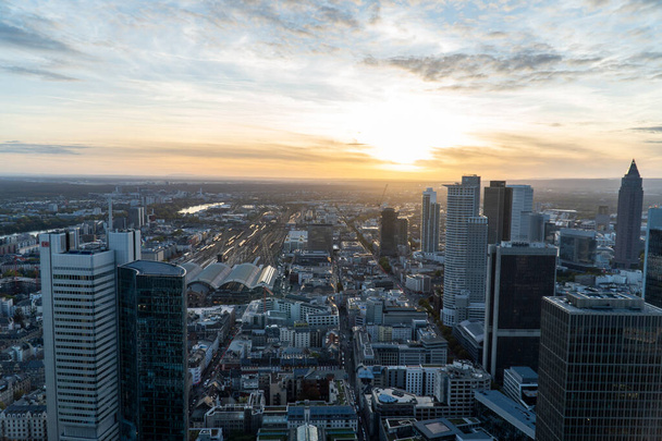 Aerial view of the Frankfurt skyline during sunset. Modern building reflecting the last sunligh of the day. - Φωτογραφία, εικόνα