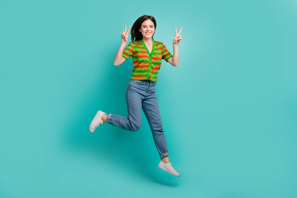 Full length photo of cheerful glad lovely lady wear trendy clothes hurry store low price two arm v-sign isolated on cyan color background. - Foto, Bild