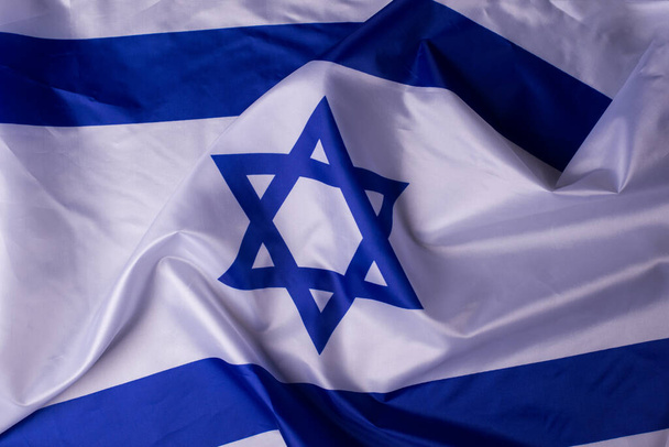 Bandera con Bandera Oficial de Israel. Bandera ondeada de Israel República parlamentaria unitaria - Foto, Imagen