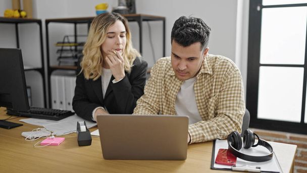 Man and woman business workers using laptop working at office - Photo, Image