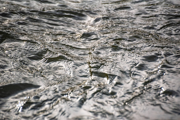 The play of sunlight and the flow of water - Photo, Image