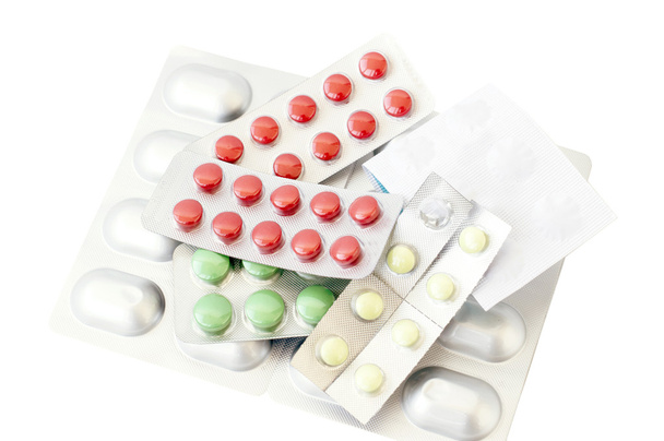verschiedene Tabletten in verschiedenen Farben  - Foto, Bild