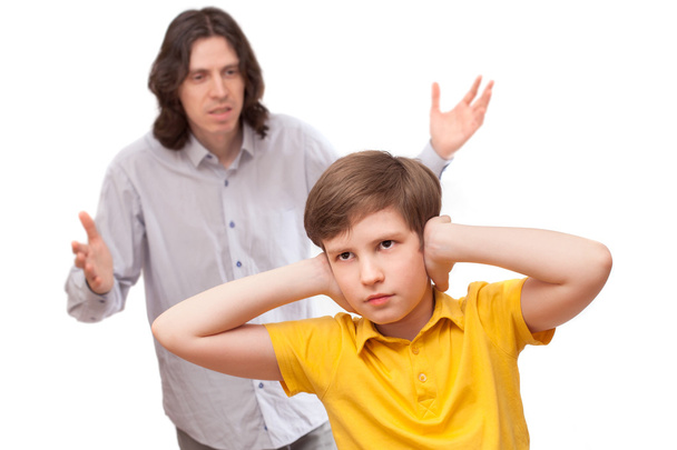 Man shouting at a small boy who is not listening - Foto, Imagen