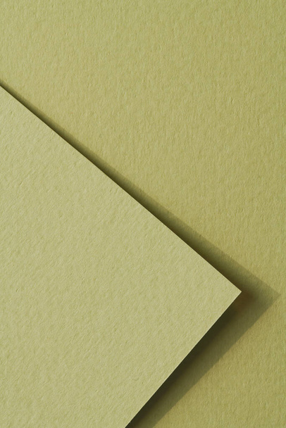 Rough kraft paper pieces background, geometric monochrome paper texture pale green color. Mockup with copy space for text - Foto, imagen
