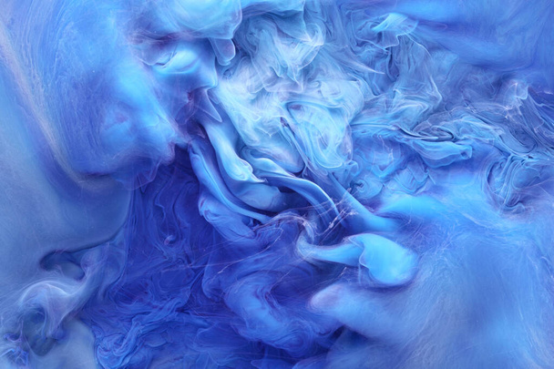 Blue contrast liquid art background. Paint ink explosion, abstract clouds of smoke mock-up, watercolor underwater - Foto, afbeelding
