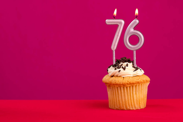 Candle number 76 - Cake birthday in rhodamine red background - Fotografie, Obrázek