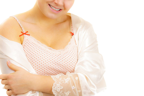 Woman in underwear dotted shirt showing her neckline - Photo, image
