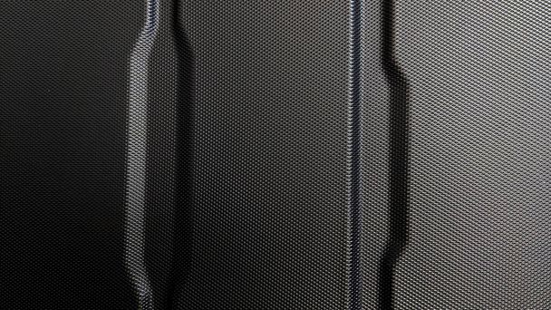 Abstract carbon fiber fabric, with black carbon fiber texture. - Photo, image