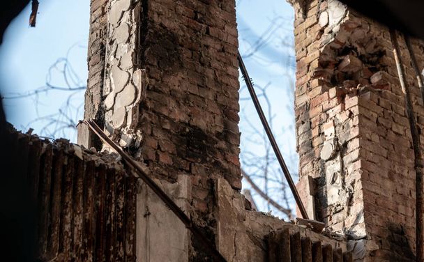 empty windows of a damaged house war in Ukraine - Фото, зображення