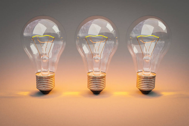 three retro style lightbulbs with glowing filament standing in row on infinite colorful background; creativity design concept; 3D Illustration - Фото, изображение