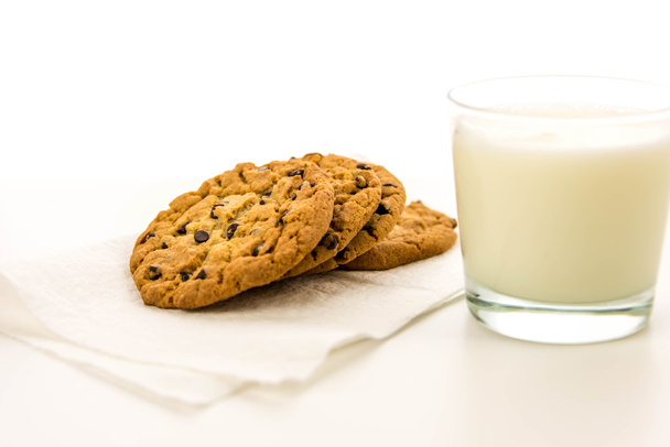 chocolate chip cookies and glass of milk - Фото, зображення